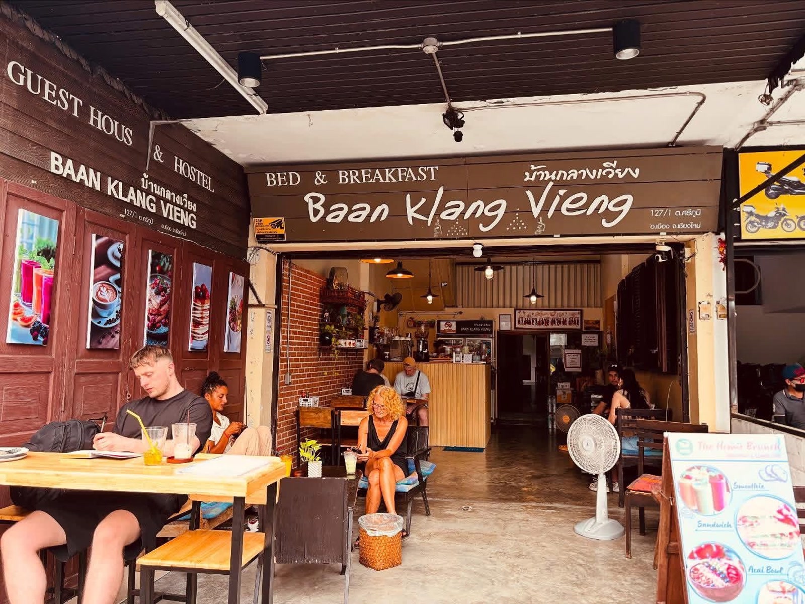 Baan Klang Vieng guest house entrance and coffee corner in Chiang Mai old town